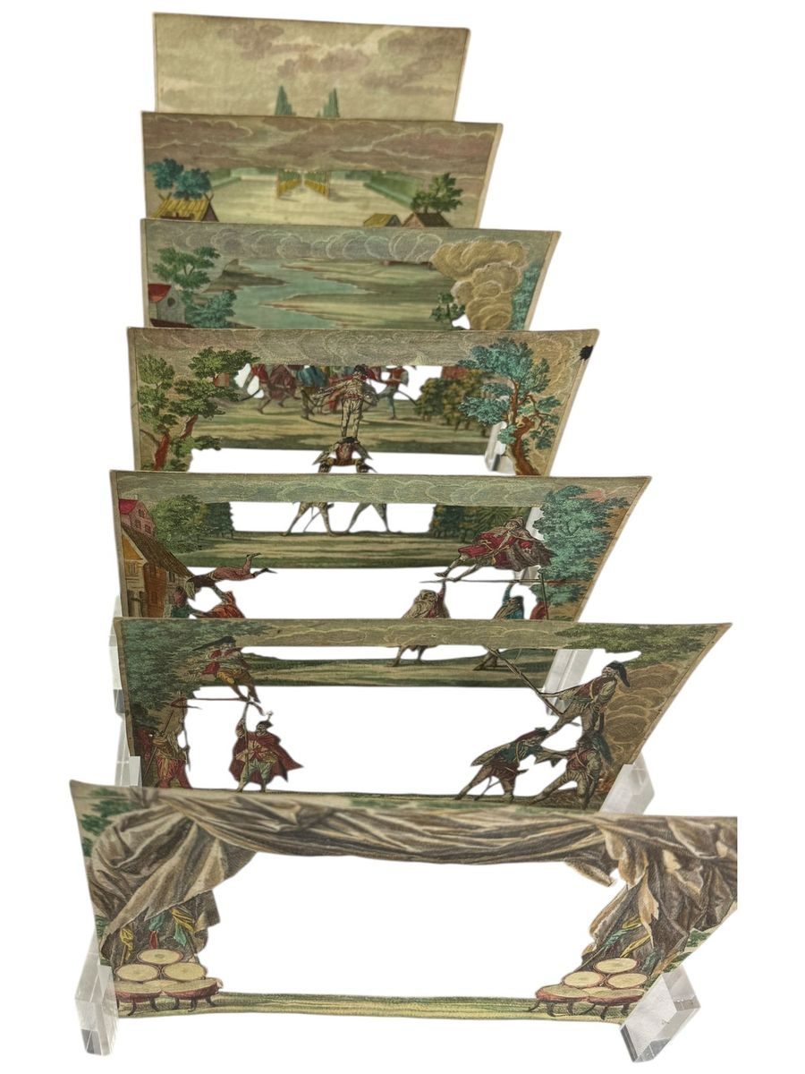 A perspective theatre: cut-out planes stacked one behind another into a stage.